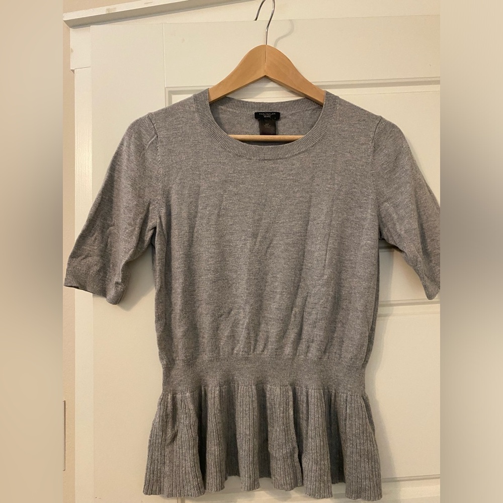 Ann Taylor size MP gray sweater with peplum details and short sleeves